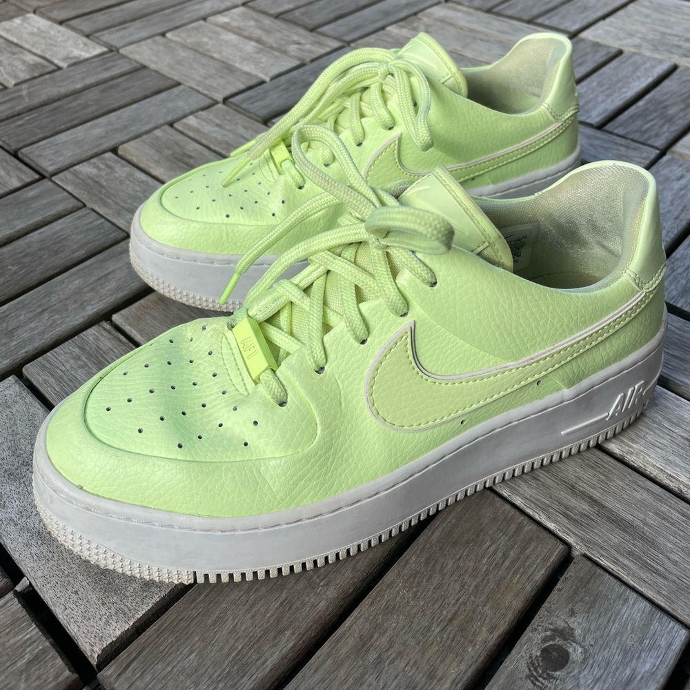 Neon yellow Nike Air Force 1s.